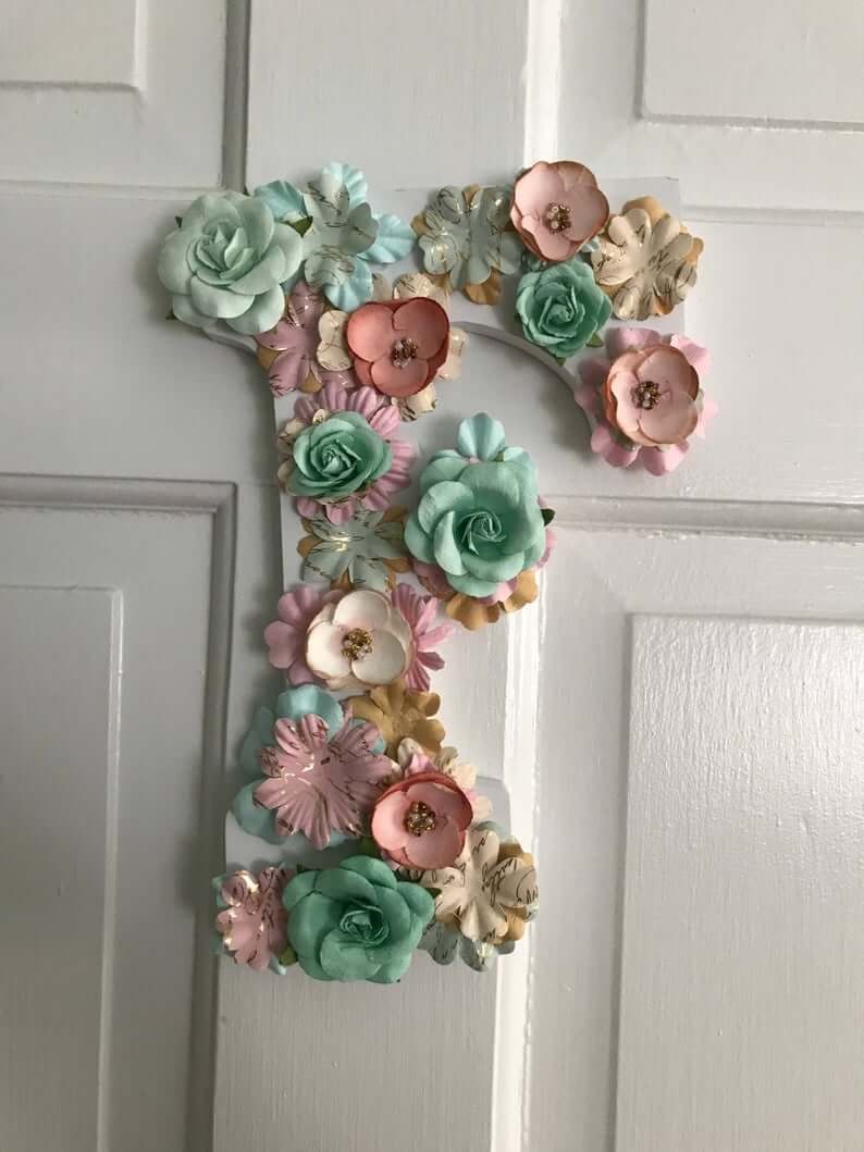 Green, Pink and Gold Flower Letter Design