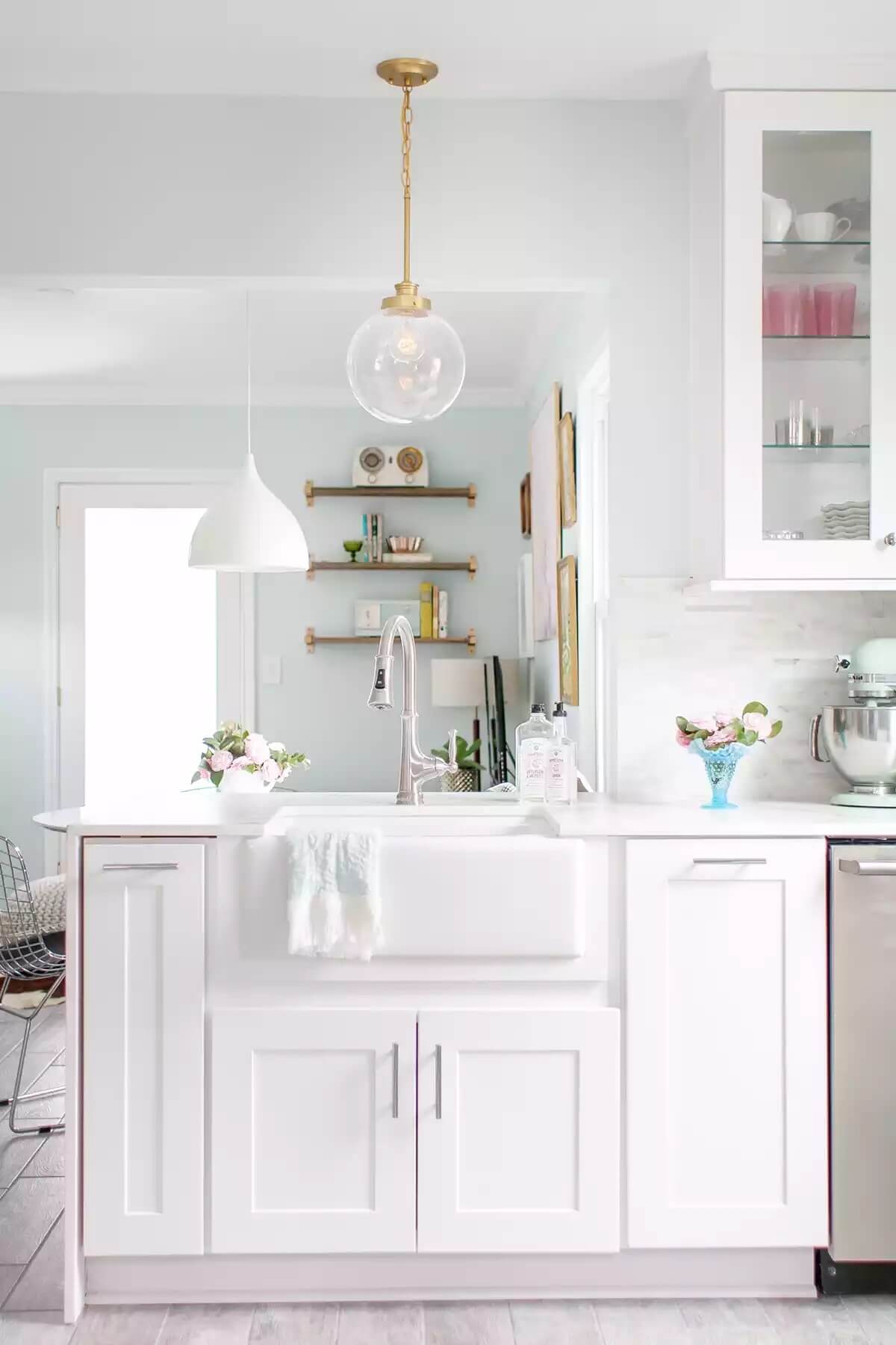 Alabaster Kitchen with Glass Cupboards and Accents