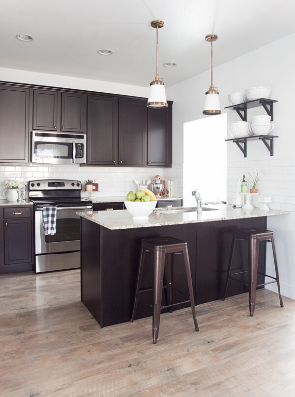 Ebony and Marble Kitchen with Repurposed Lighting