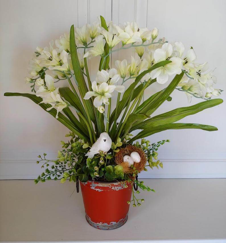 Terracotta Pot with Tall Flower Grouping and Bird Nest