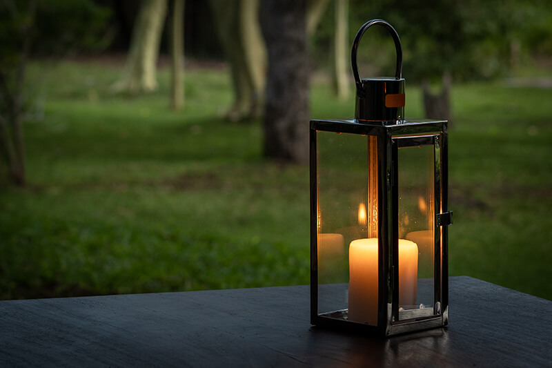 Candles in DIY garden lantern