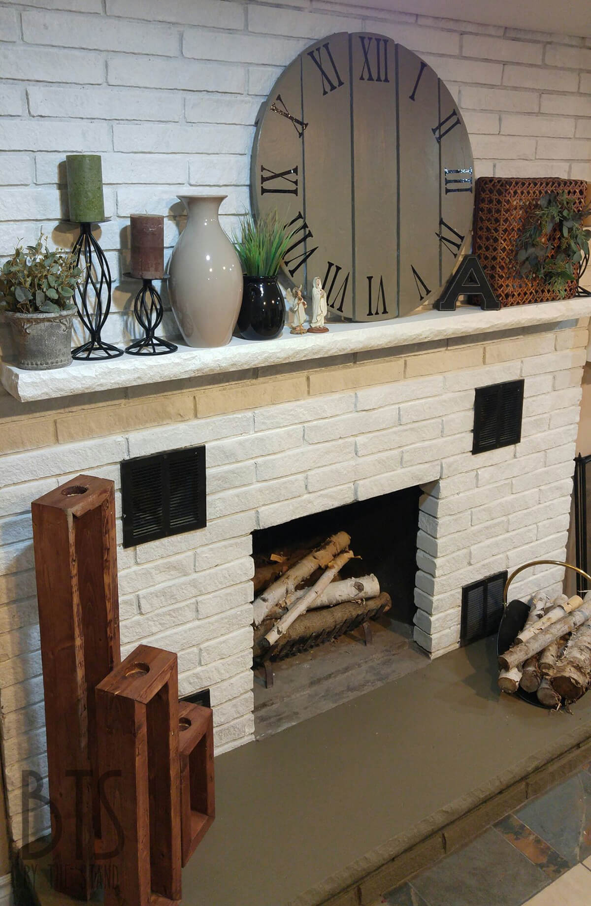 Abundantly Accessorized Mantel on White Fireplace