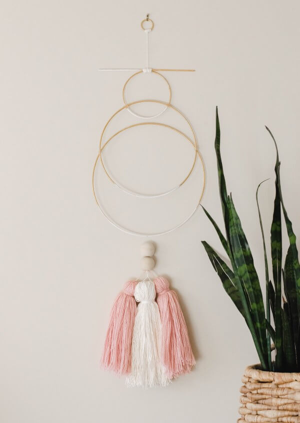 Uniquely Designed Golden Tassel Wall Art