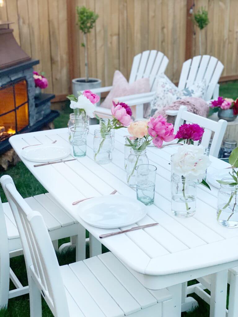 Staggered Single Stem Peony in Vase Centerpiece