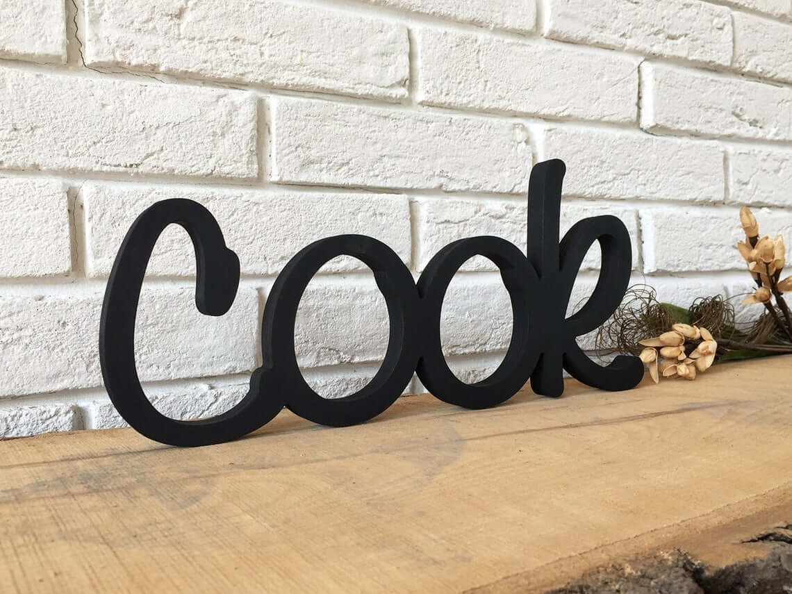 Black Wooden Script Cook Sign