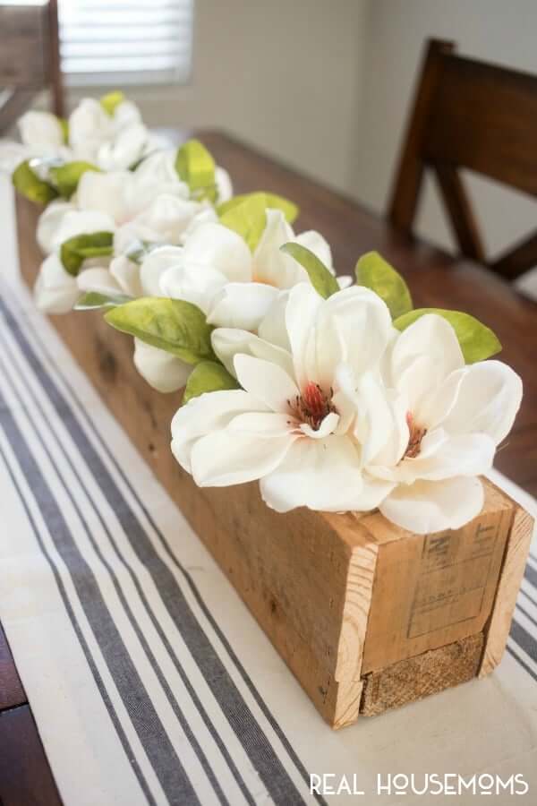 Long, Wooden Spring Magnolia Centerpiece