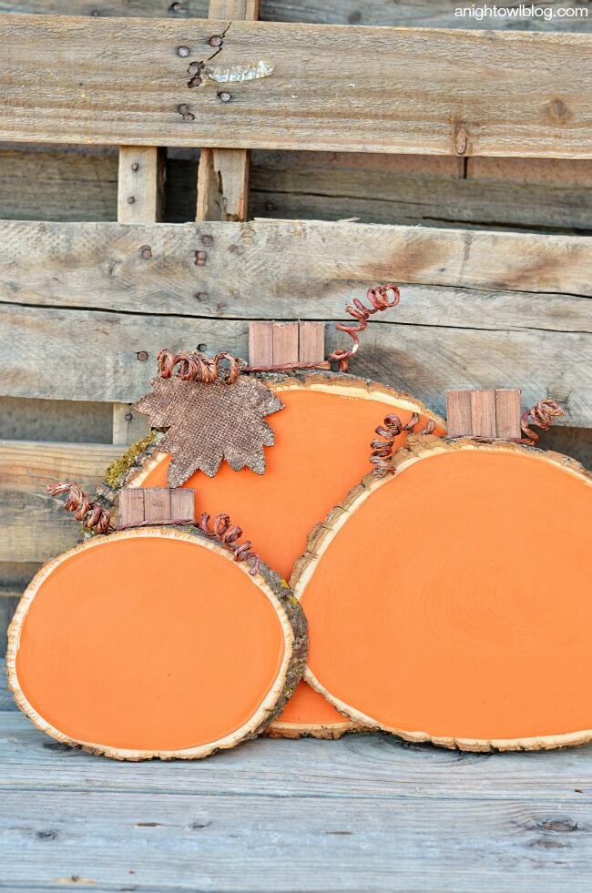 DIY Painted Wood Slice Pumpkins